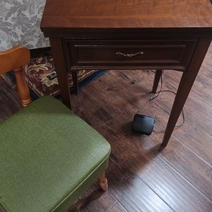 Kenmore sewing machine with desk and chair.